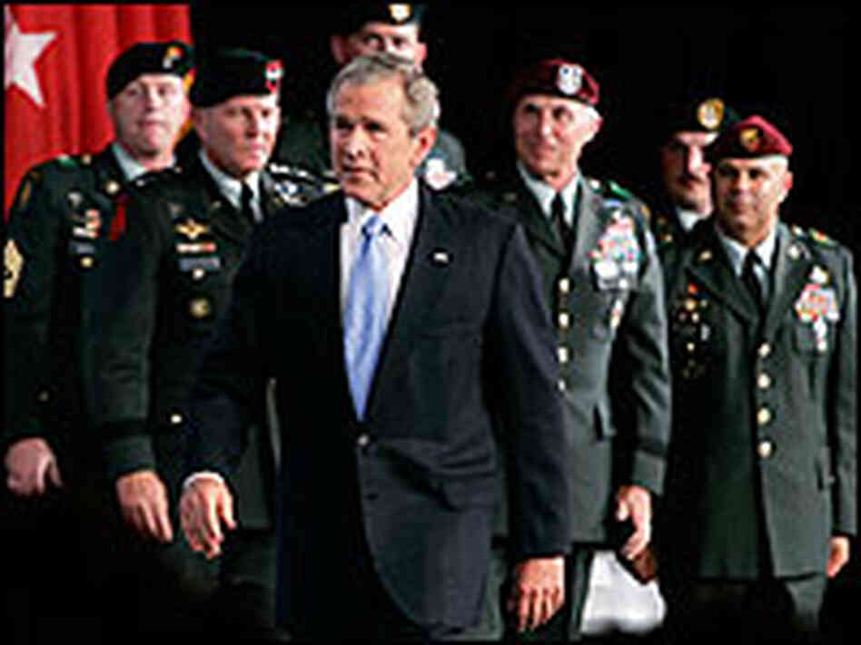 President Bush walks away from podium after Fort Bragg speech on Iraq. President Bush walks away from podium after Fort Bragg speech on Iraq.