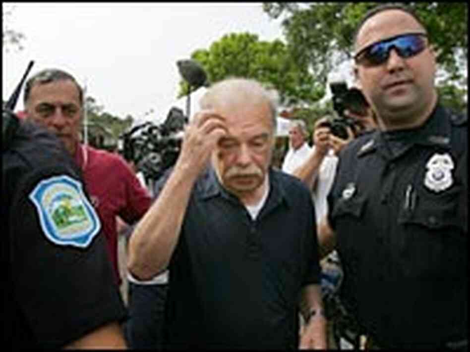 Terri Schiavo's father Bob Schindler, surrounded by a police escort, leaves the Woodside Hospice. Terri Schiavo's father Bob Schindler, surrounded by a police escort, leaves the Woodside Hospice.