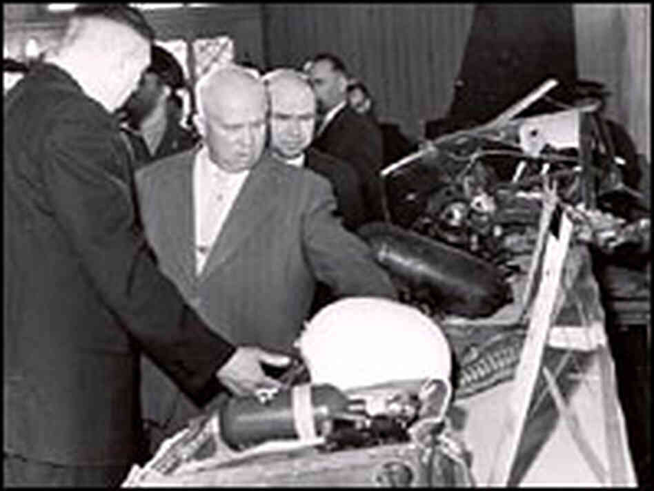 Soviet Premier Nikita Khrushchev examines items retrieved from the downed U-2 spy plane. Soviet Premier Nikita Khrushchev examines items retrieved from the downed U-2 spy plane.