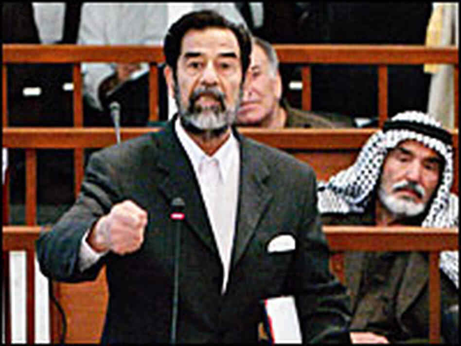 Former Iraqi leader Saddam Hussein appears in a Baghdad courtroom Monday, Nov. 28. Former Iraqi leader Saddam Hussein appears in a Baghdad courtroom Monday, Nov. 28.