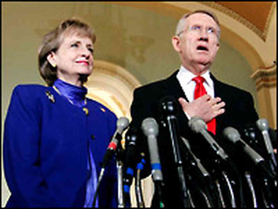 Supreme Court nominee Harriet Miers listens to Senate Minority Leader Harry Reid. Supreme Court nominee Harriet Miers listens to Senate Minority Leader Harry Reid.