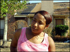 Kelli Wilkerson stands in front of her home on Honeysuckle Lane in late September Kelli Wilkerson stands in front of her home on Honeysuckle Lane in late September