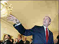 President Bush shot from a low angle. President Bush shot from a low angle.