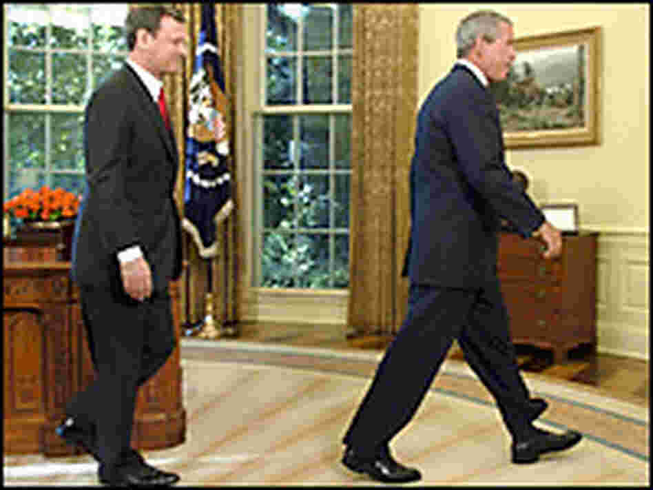 Roberts with President Bush. Credit: Reuters Roberts with President Bush. Credit: Reuters