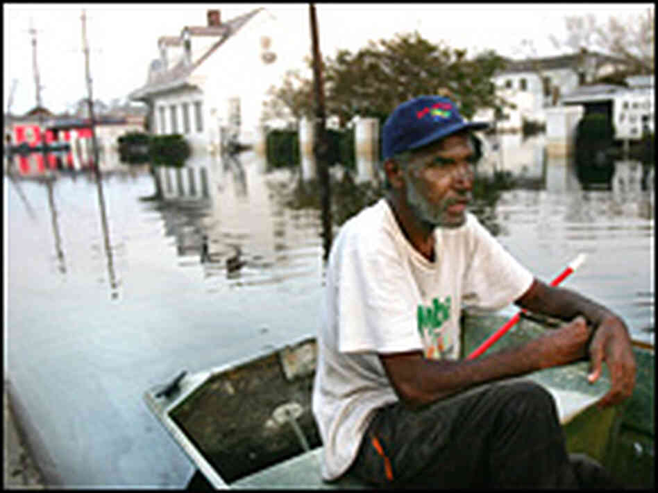 Errol Morning, 60, sits on his boat on a flooded street in New Orleans Sept. 5. Errol Morning, 60, sits on his boat on a flooded street in New Orleans Sept. 5.