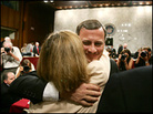 Chief Justice nominee John Roberts hugs his wife Jane on Capitol Hill. Chief Justice nominee John Roberts hugs his wife Jane on Capitol Hill.