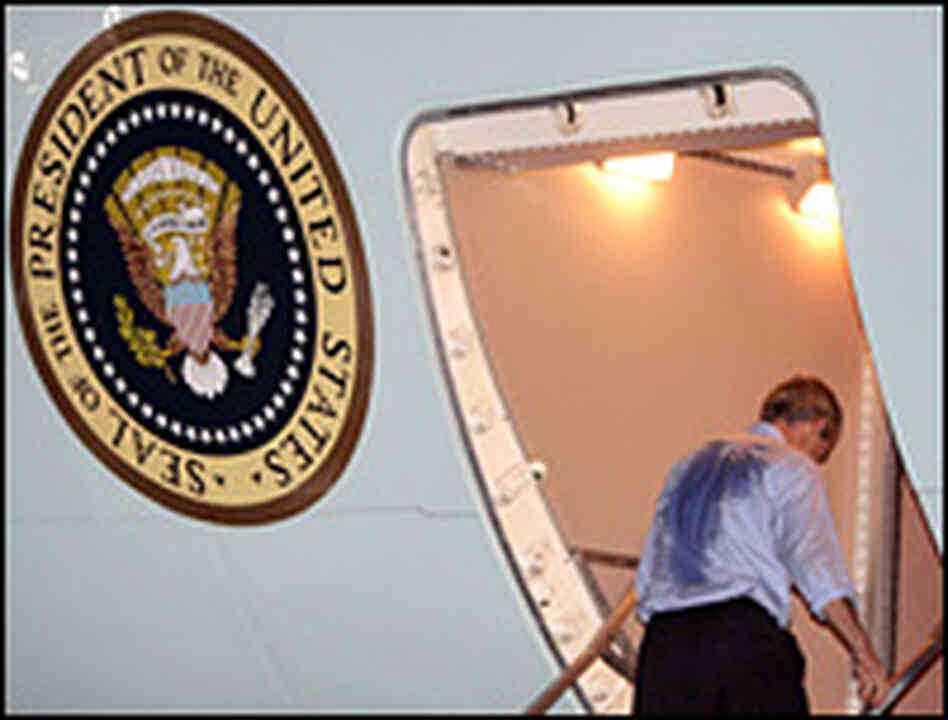 President Bush boards Air Force One after speaking about Hurricane Katrina's damage. President Bush boards Air Force One after speaking about Hurricane Katrina's damage.