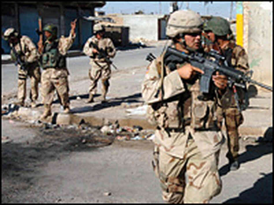U.S. Army and Iraqi soldiers conduct a security patrol in the northern Iraqi town of Tal Afar. U.S. Army and Iraqi soldiers conduct a security patrol in the northern Iraqi town of Tal Afar.
