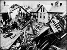 People stand amid the destruction in Johnstown. Credit: Johnstown Area Heritage Association. People stand amid the destruction in Johnstown. Credit: Johnstown Area Heritage Association.