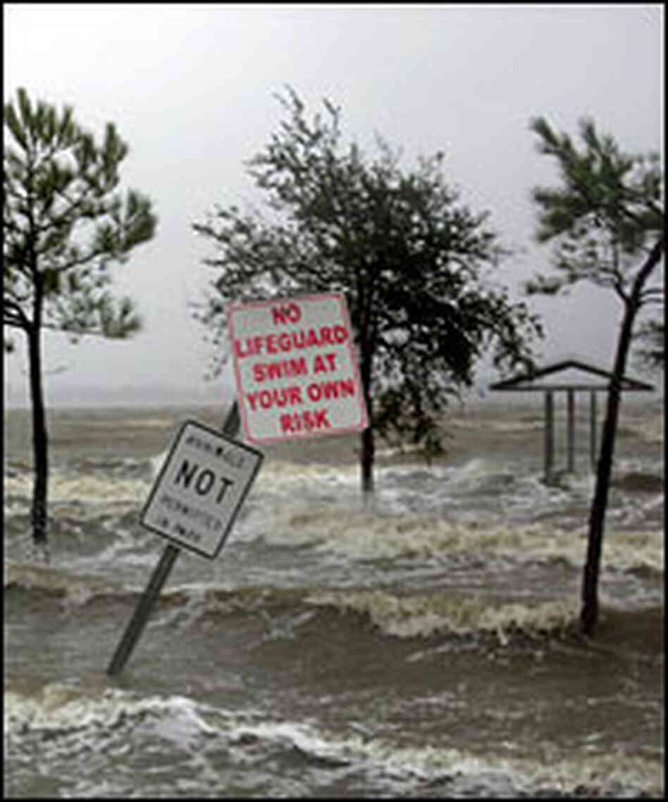 Surging waters of Lake Charles flood a parking lot as Hurricane Rita hits Lake Charles, La. Surging waters of Lake Charles flood a parking lot as Hurricane Rita hits Lake Charles, La.