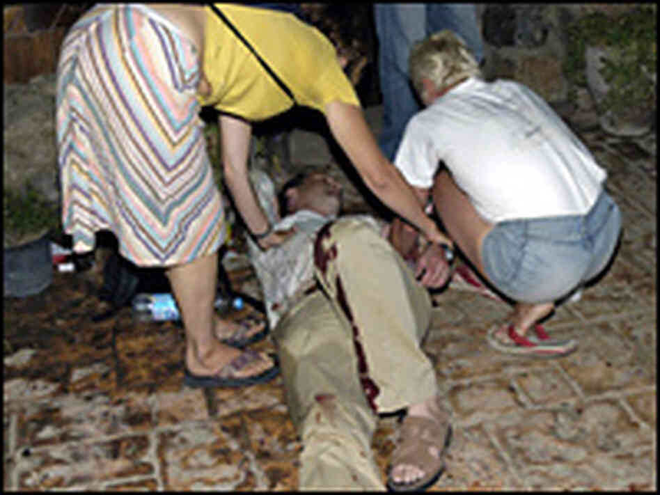 An injured foreign tourist is attended to after explosions shook resort city of Dahab. An injured foreign tourist is attended to after explosions shook resort city of Dahab.