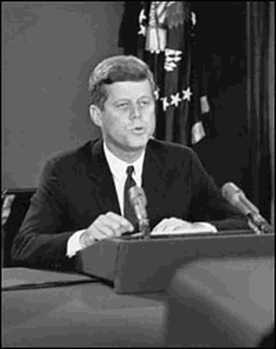 President Kennedy delivers a televised address about the Cuban missile crisis in October 1962. President Kennedy delivers a televised address about the Cuban missile crisis in October 1962.