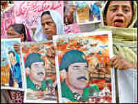 With Saddam Hussein's execution looming, Pakistani protesters shout slogans at a rally in Karachi. With Saddam Hussein's execution looming, Pakistani protesters shout slogans at a rally in Karachi.