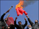Demonstrators burn a Danish flag in Kabul.