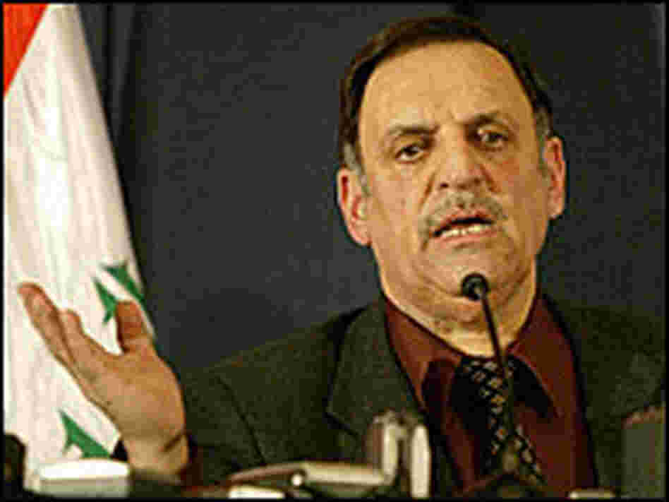 Safwat Rashid of Iraq's electoral commission announces election results.