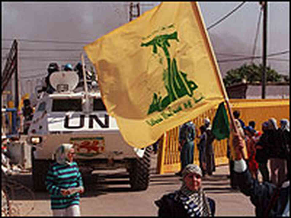 Lebanese population and Hezbollah militants celebrate the Israeli army's pull-out from southern Leba Lebanese population and Hezbollah militants celebrate the Israeli army's pull-out from southern Leba