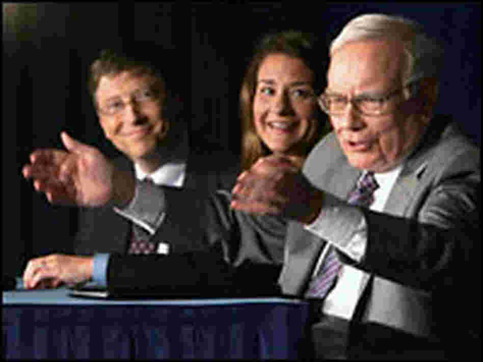 Warren Buffett, right, speaks alongside Bill and Melinda Gates as they detail Buffett's gift. Warren Buffett, right, speaks alongside Bill and Melinda Gates as they detail Buffett's gift.