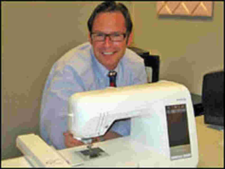 Dean Shulman of Brother International and the company's Innovis 5000D sewing machine.