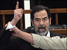 Saddam Hussein yells at the court as he receives his death sentence. Saddam Hussein yells at the court as he receives his death sentence.