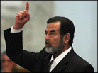 Saddam yells at the court as he receives his sentence. Saddam yells at the court as he receives his sentence.