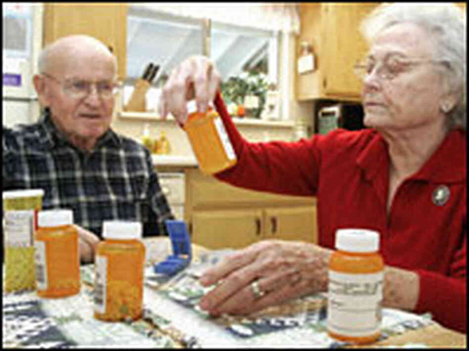 Seniors sort through prescription drugs Seniors sort through prescription drugs