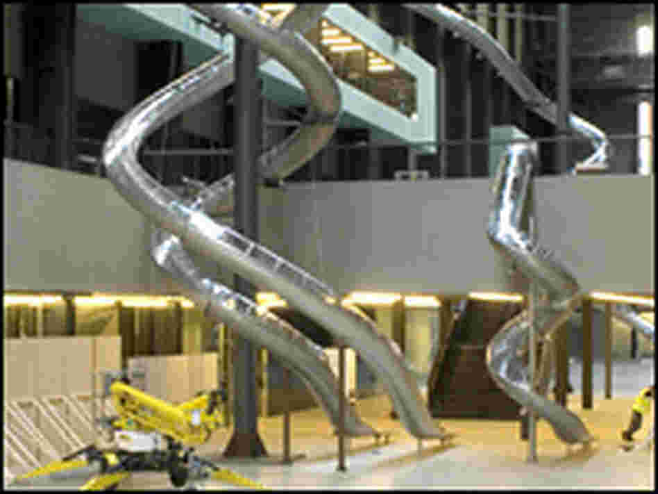 Is It Art -- or Just Fun? The slides glide down to the Tate Modern's floor.