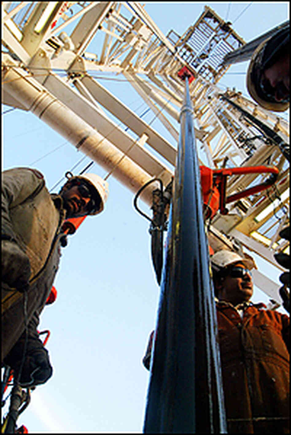 A Kuwait Oil Company drilling rig operates on the northern border with Iraq.