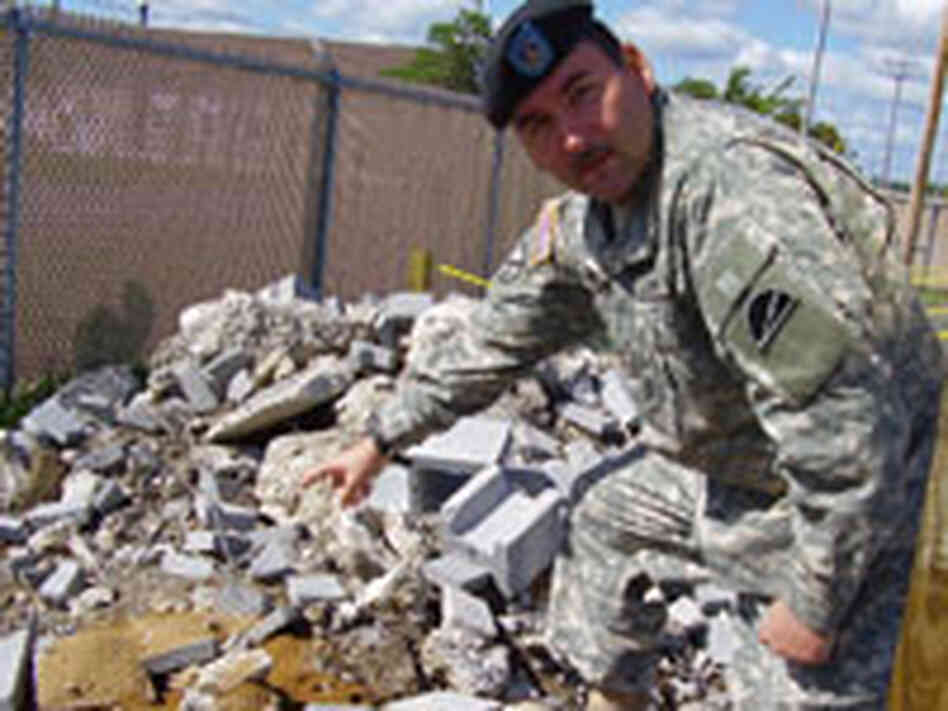 Sgt. Todd Coudret points Sgt. Todd Coudret points