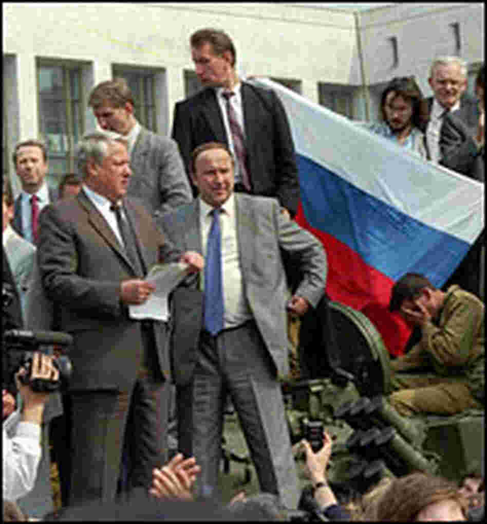 Boris Yeltsin stands atop an armored personnel carrier in Moscow in 1991.