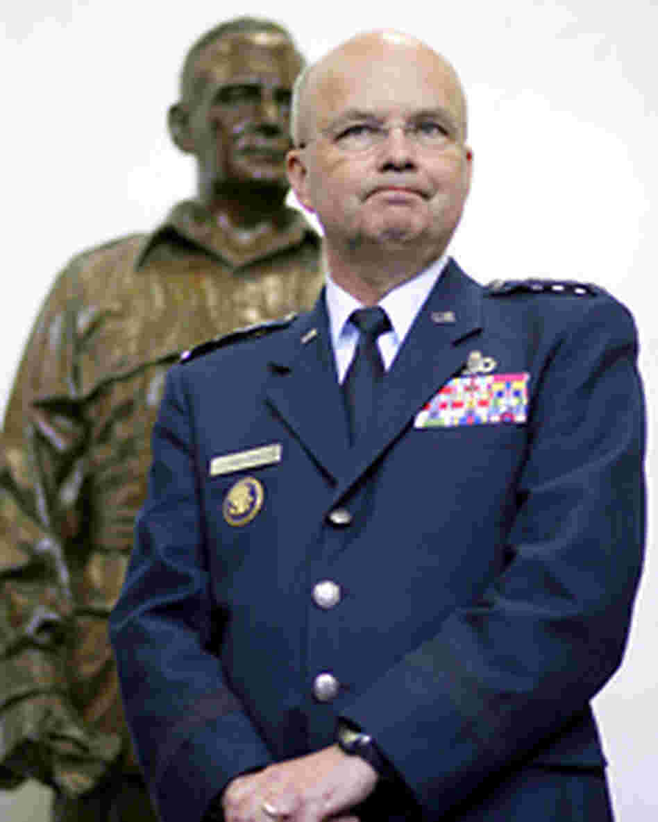 Central Intelligence Agency Director Gen. Michael Hayden in front of a statue of William Donovan. Central Intelligence Agency Director Gen. Michael Hayden in front of a statue of William Donovan.
