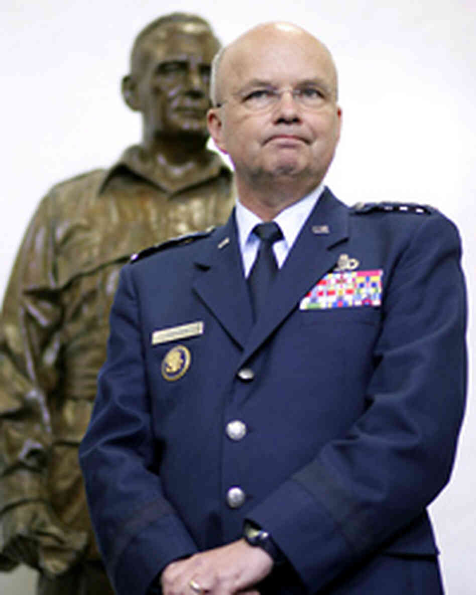 Central Intelligence Agency Director Gen. Michael Hayden in front of a statue of William Donovan. Central Intelligence Agency Director Gen. Michael Hayden in front of a statue of William Donovan.