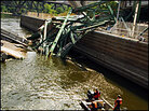 U.S. Navy divers survey the wreckage of the Interstate 35 West bridge in Minneapolis, Minn. U.S. Navy divers survey the wreckage of the Interstate 35 West bridge in Minneapolis, Minn.