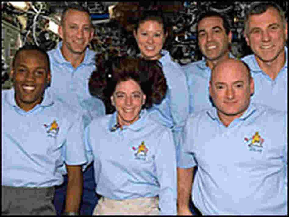 This image from NASA shows the shuttle crew posing for an in-space portrait on Aug. 17.