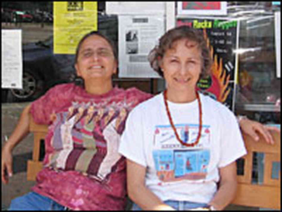 Sisters Cynthia (left) and Lidia Perez sit in front of Las Manitas Cafe