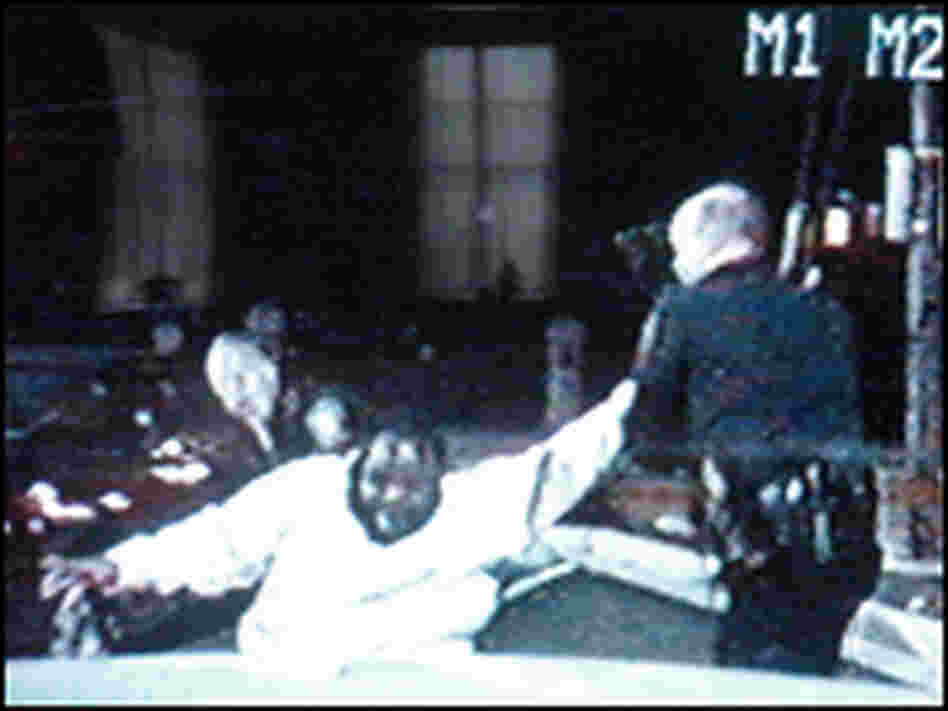 A handout image provided by the Cincinnati Police Department depicts officers and Jones.