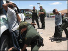 Border Patrol agents frisk illegal immigrants just caught in Nogales, Ariz. Border Patrol agents frisk illegal immigrants just caught in Nogales, Ariz.