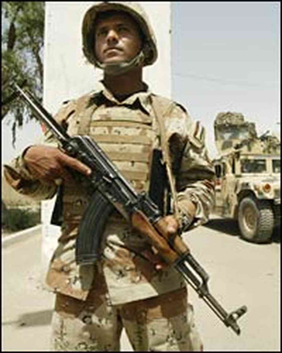 An Iraqi soldier mans a checkpoint in the restive Baghdad neighborhood of Yarmuk An Iraqi soldier mans a checkpoint in the restive Baghdad neighborhood of Yarmuk