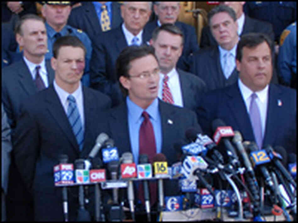 FBI agent J.P. Weiss addresses the media outside Camden Federal Courthouse.