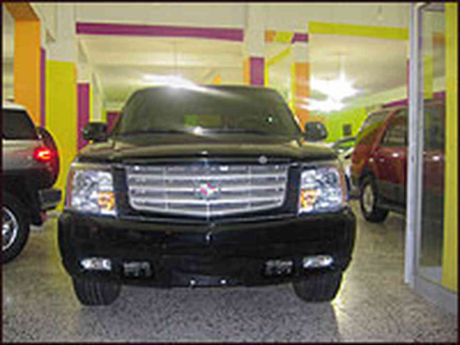 A Cadillac sits in a showroom in Libya A Cadillac sits in a showroom in Libya