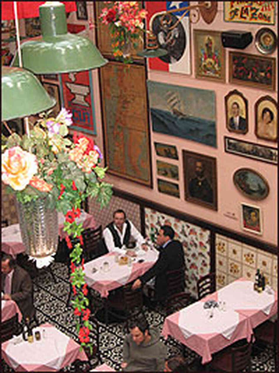 The walls at Liguria are covered with an eclectic assortment of items. The walls at Liguria are covered with an eclectic assortment of items.