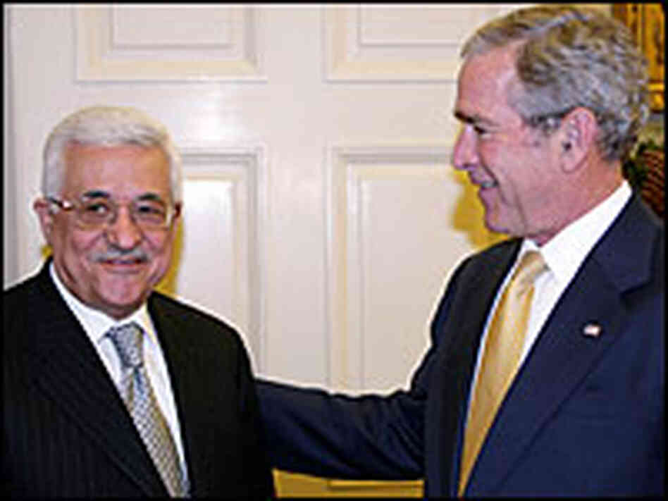 President Bush (right) meets with Palestinian President Mahmoud Abbas on Monday.