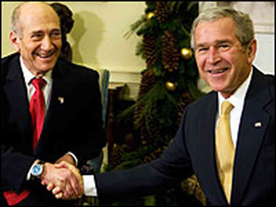 President Bush (right) meets with Israeli Prime Minister Ehud Olmert at the White House on Monday.