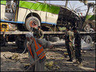 Municipal workers clean up after a suicide attack in Kabul, Afghanistan, earlier this month. Municipal workers clean up after a suicide attack in Kabul, Afghanistan, earlier this month.
