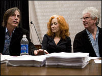 Bonnie Raitt (center) listens to Jackson Browne (left) speak during a news conference on Capitol Hill while Graham Nash looks on, Oct. 23, 2007. Raitt, Browne and Nash joined members of Congress and environmental groups to speak about an anti-nuclear campaign they support.