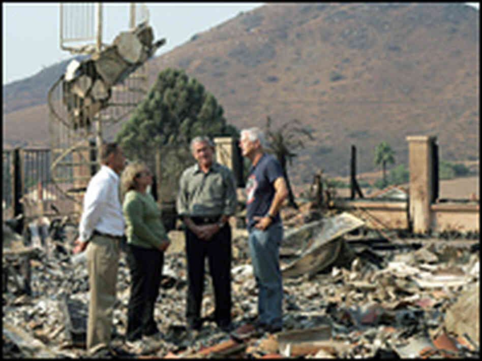 President Bush visits with Jay and Kendra Jeffcoat and U.S. Rep. Brian Bilbray (left).
