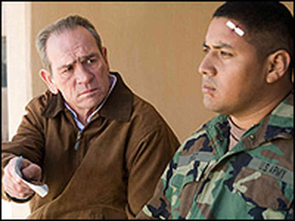 Tommy Lee Jones, as a father searching for his A.W.O.L. son, questions Victor Wolf. Tommy Lee Jones, as a father searching for his A.W.O.L. son, questions Victor Wolf.
