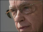 A tight shot of the face of retired judge Michael Mukasey A tight shot of the face of retired judge Michael Mukasey
