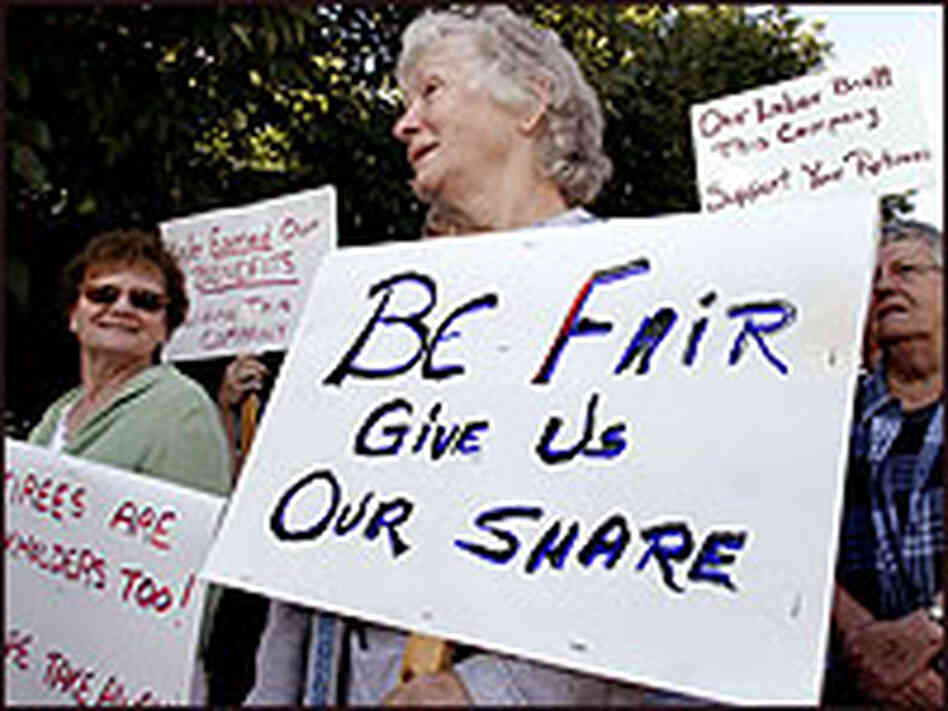 Eileen Duff of Lansing, Mich., the wife of a retired United Auto Workers union member, pickets. Eileen Duff of Lansing, Mich., the wife of a retired United Auto Workers union member, pickets.