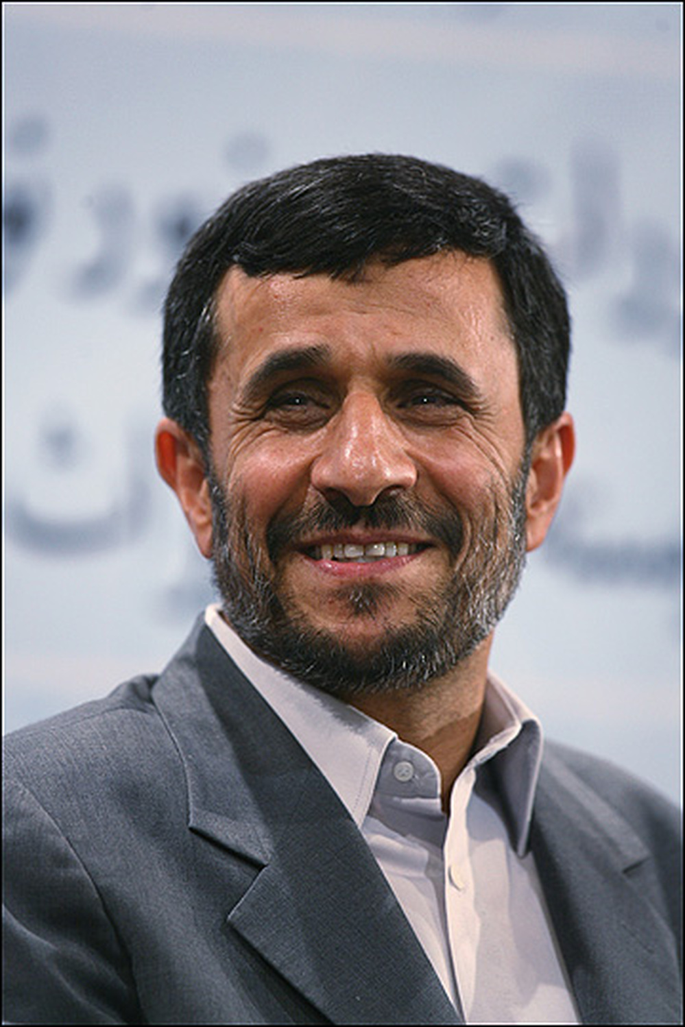A smiling Mahmoud Ahmadinejad, photographed in August 2007.