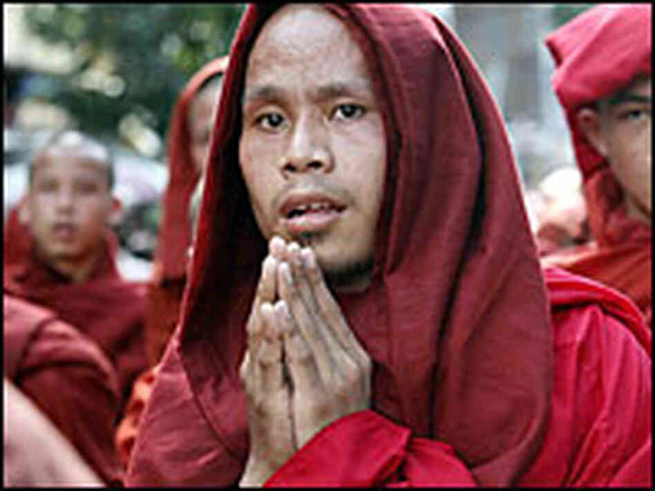 Buddhist monks march down a street in Yangon, Myanmar, on Tuesday.